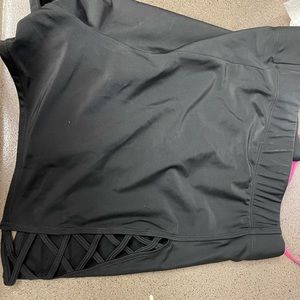 Black swim bottoms with lattice style sides